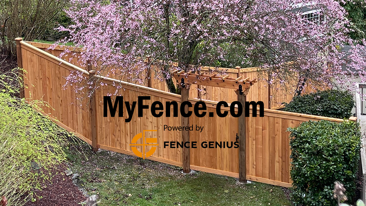 Picture frame fence corner with pergola and flowering tree - Seattle fence installation