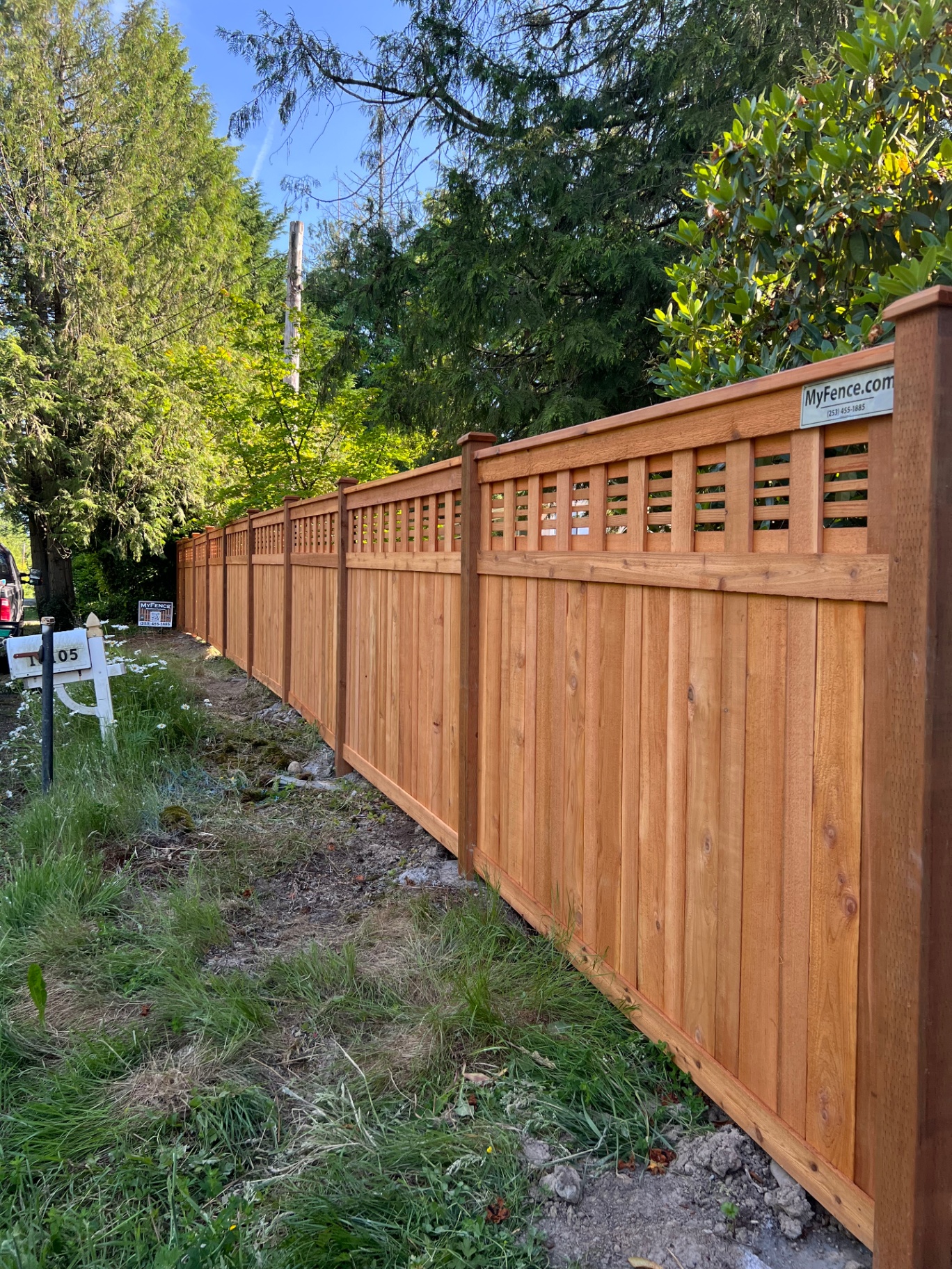 Long run of horizontal lattice fence showing stainless steel construction