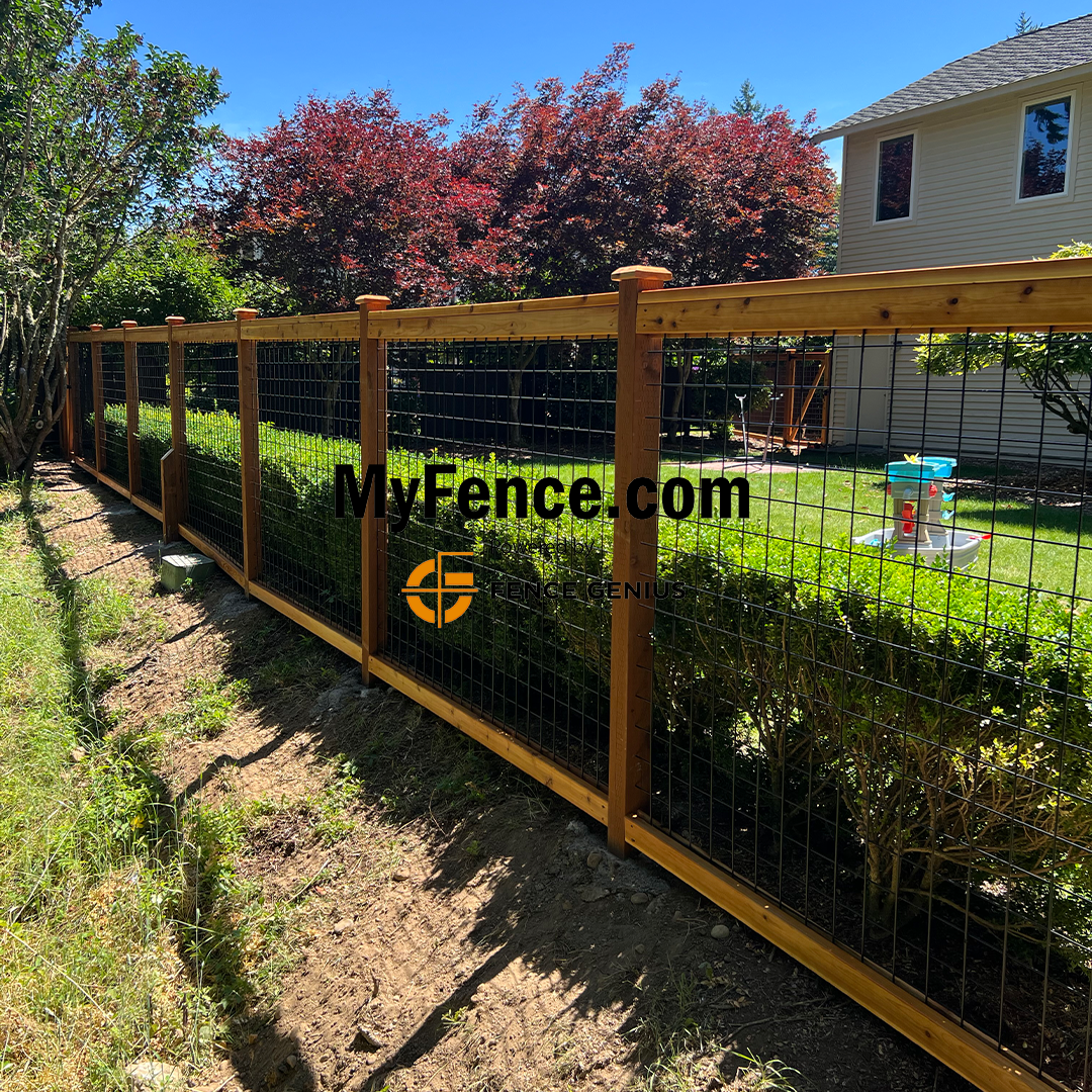 Black hogwire fence showing brand marking