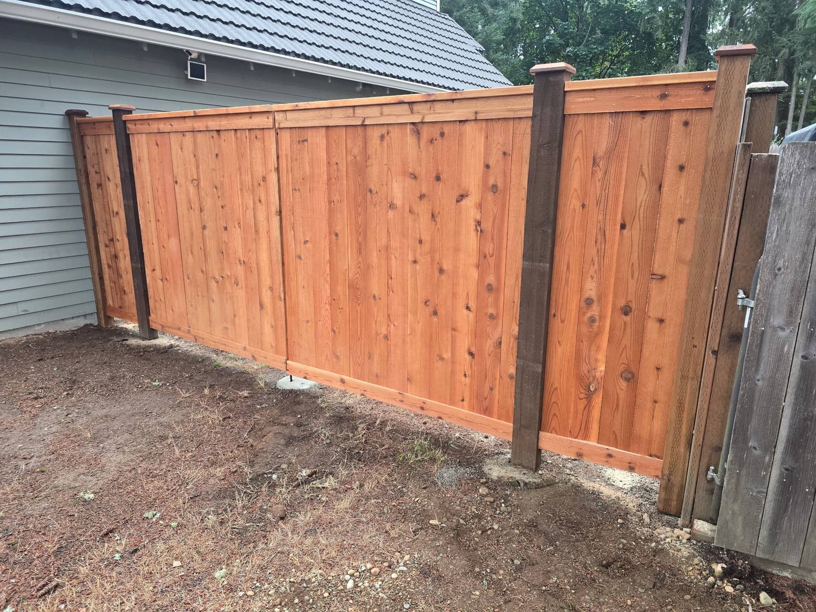 Penofin stained cedar picture frame fence in Kent, WA